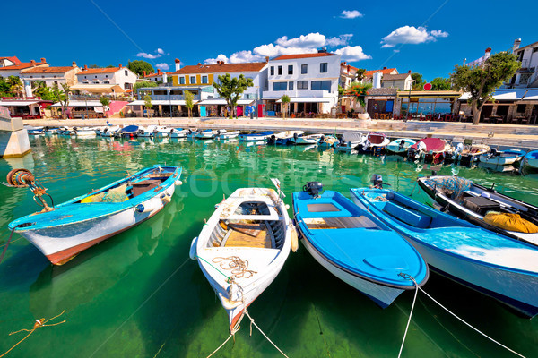 Town of Njivice turquoise harbor and waterfront view Stock photo © xbrchx
