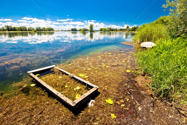 Stock photo: Old sinked boat on Soderica lake