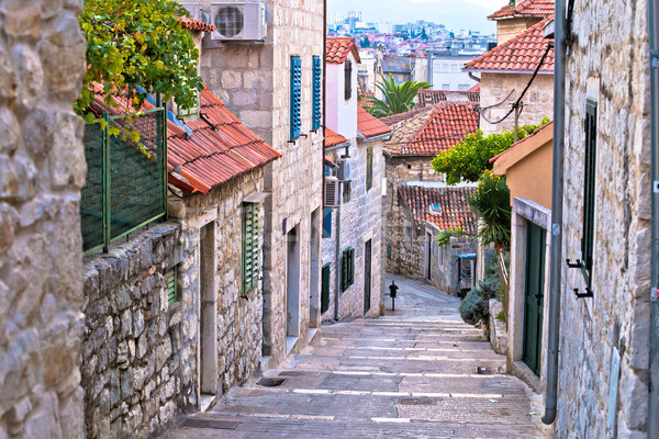 Old stone street of Split historic city Stock photo © xbrchx