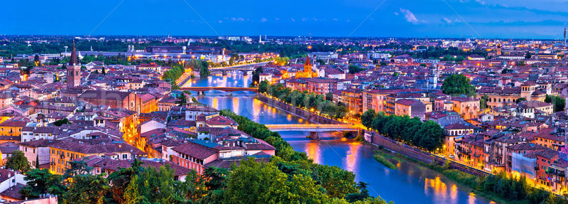 Verona old city and Adige river panoramic aerial view at evening Stock photo © xbrchx