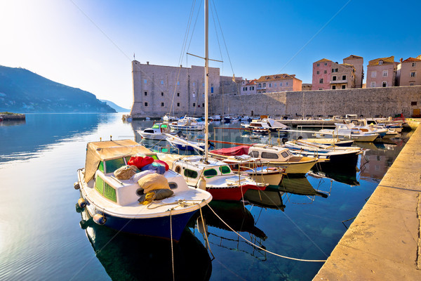 Dubrovnik harbor and city walls morning view Stock photo © xbrchx