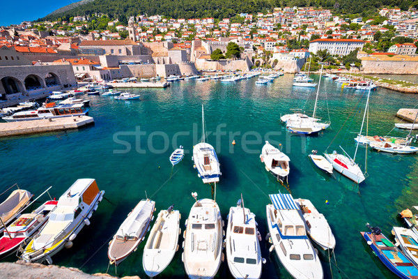 Dubrovnik harbor and city walls view Stock photo © xbrchx