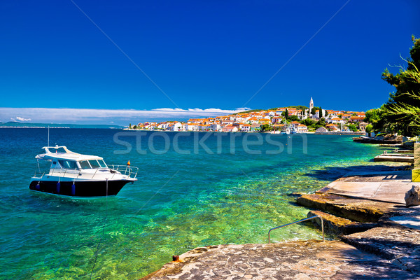 Kali beach and  boat on turquoise sea Stock photo © xbrchx