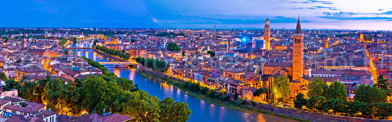 Verona old city and Adige river panoramic aerial view at evening Stock photo © xbrchx
