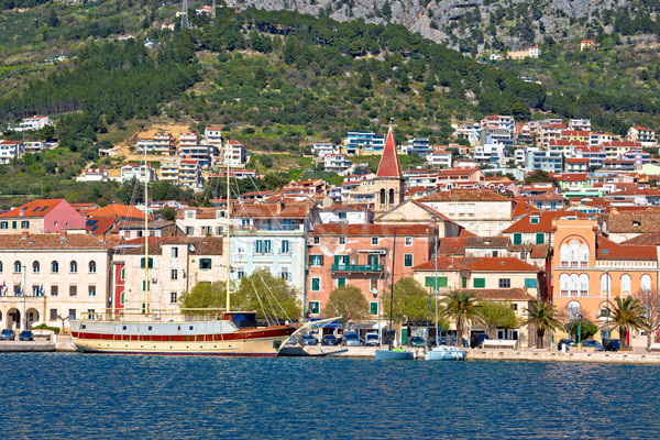 Makarska boats and waterfront under Biokovo mountain view Stock photo © xbrchx