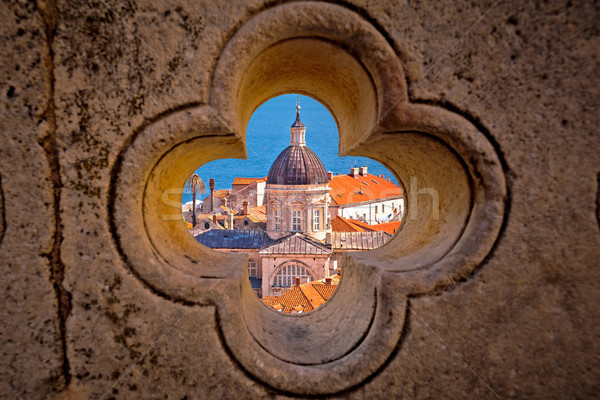 Dubrovnik landmarks view through stone carved detail Stock photo © xbrchx