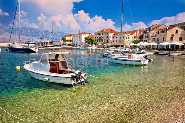Turquoise beach and harbor of Postira village Stock photo © xbrchx