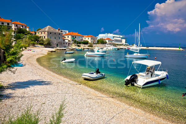 Beach and waterfront of Postira village Stock photo © xbrchx