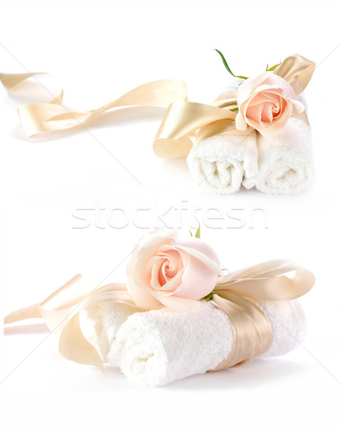 Rose with decorative ribbons over Rolled up Bath Towels Stock photo © xura