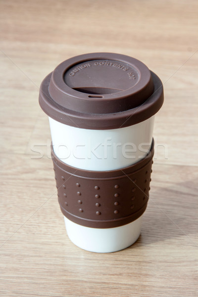 close up coffee cup on blurry wood table background Stock photo © yanukit