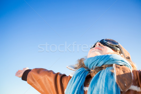 Stock fotó: Boldog · gyerek · játszik · játék · repülőgép · kék · ég