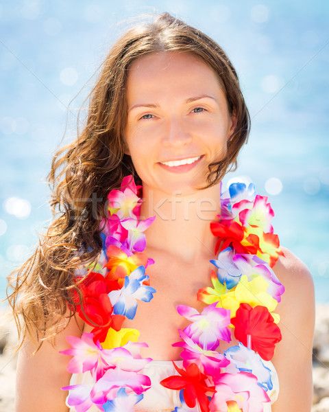 Woman with hawaiian flowers garland Stock photo © Yaruta