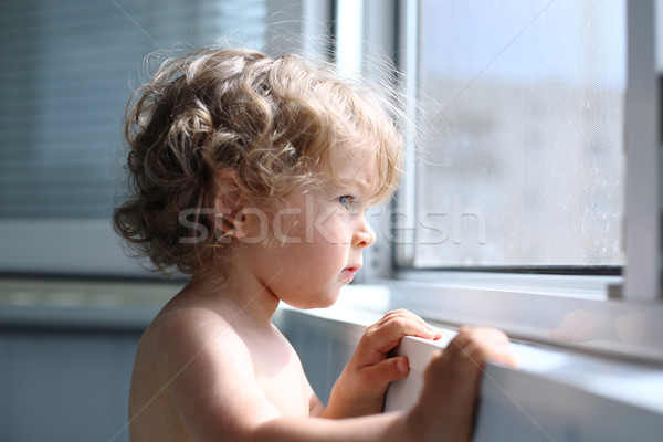 Child looking into window Stock photo © Yaruta