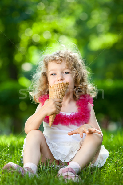 Stock photo: Child eating ice-cream