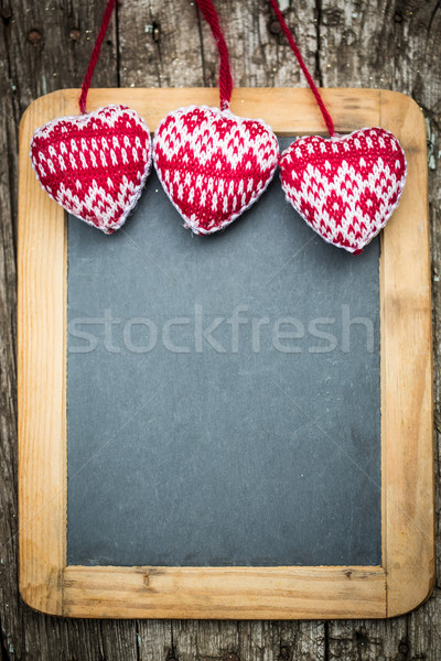 Stock photo: Christmas tree decorations border on vintage wooden blackboard