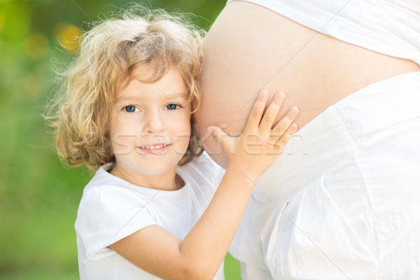 Szczęśliwy dziecko brzuch kobieta w ciąży matki dzień Zdjęcia stock © Yaruta