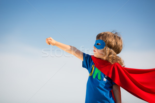 Süper kahraman çocuk mavi gökyüzü kız güç gökyüzü Stok fotoğraf © Yaruta