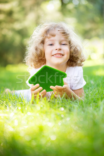 Gyermek tart öko ház zöld fű kezek Stock fotó © Yaruta