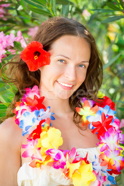 Woman in hawaiian flowers garland Stock photo © Yaruta