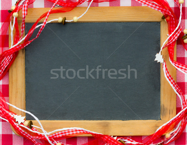 Blackboard blank framed in red Christmas decorations Stock photo © Yaruta