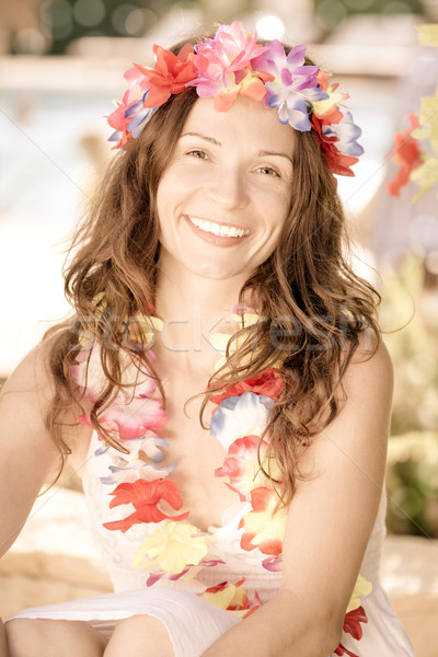 Woman wearing hawaiian flowers garland Stock photo © Yaruta