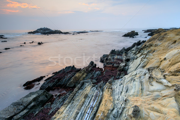 Boon hol strand schemering zonsondergang oceaan Stockfoto © yhelfman