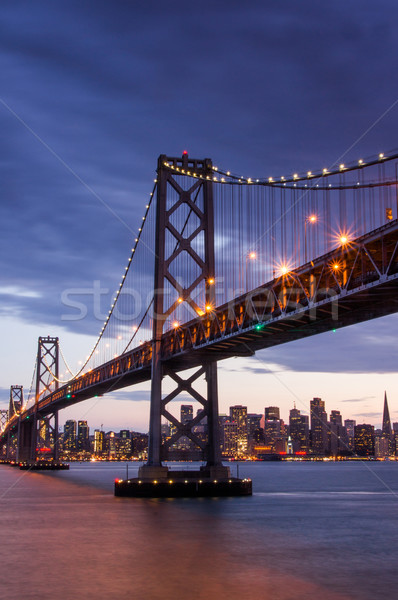 Dusk over Bay Bridge and San Francisco Skyline, California Stock photo © yhelfman