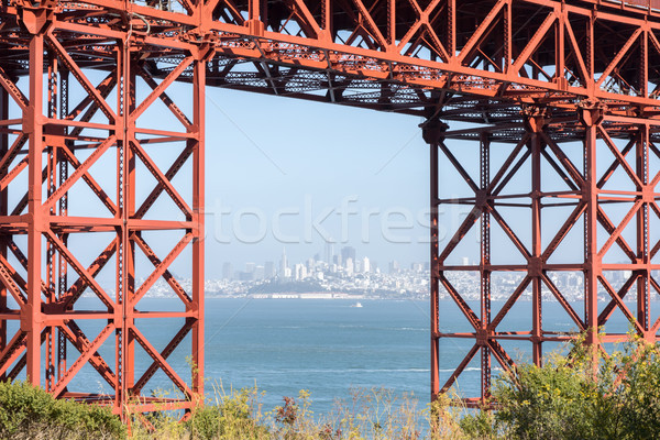 San Francisco Downtown in Hazy Summer Framed by the Golden Gate Bridge. Stock photo © yhelfman