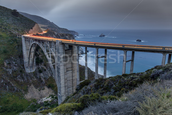 Car trails illuminating Bixby Bridge. Stock photo © yhelfman