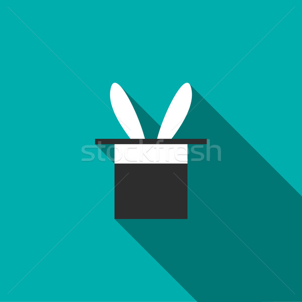 Rabbit appearing from a top magic hat icon Stock photo © ylivdesign