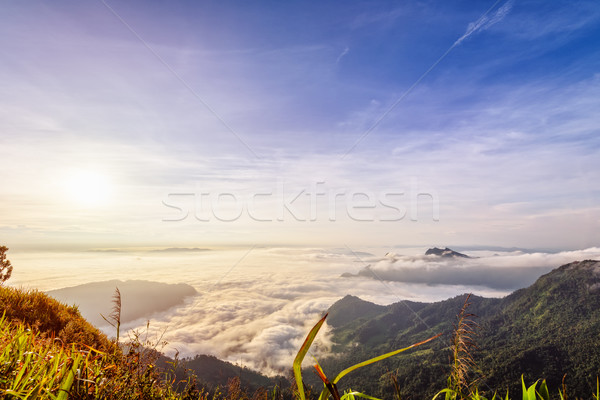 Sunrise Wolken schönen Landschaft Natur Spitze Stock foto © Yongkiet