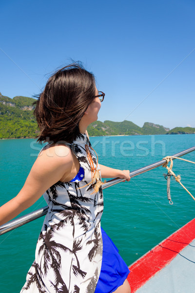 Genç kadın tekne sevimli gözlük gülen mutlulukla Stok fotoğraf © Yongkiet
