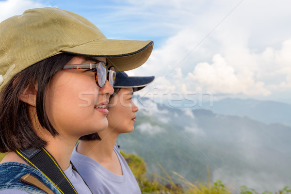 Face two young women watching nature Stock photo © Yongkiet
