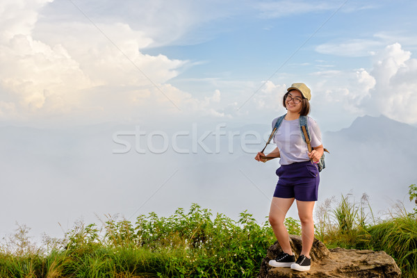 Tourist teen girl poses on mountain Stock photo © Yongkiet