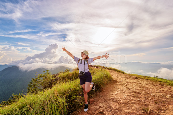 Hiker girl with happy on Phu Chi Fa Mountain Stock photo © Yongkiet