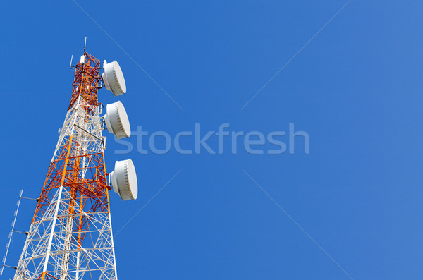 Telecommunication tower on blue sky background Stock photo © Yongkiet