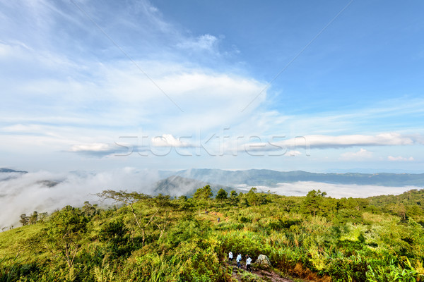 Tourists in nature on the mountain Stock photo © Yongkiet