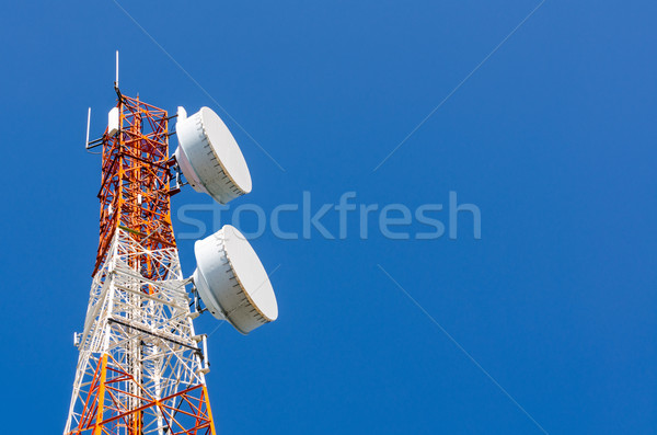 Telecommunication tower on blue sky background Stock photo © Yongkiet