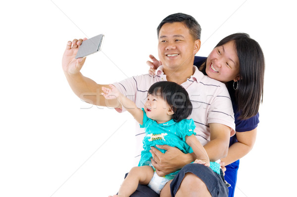 Asian familie moderne technologie leeftijd mensen Stockfoto © yongtick