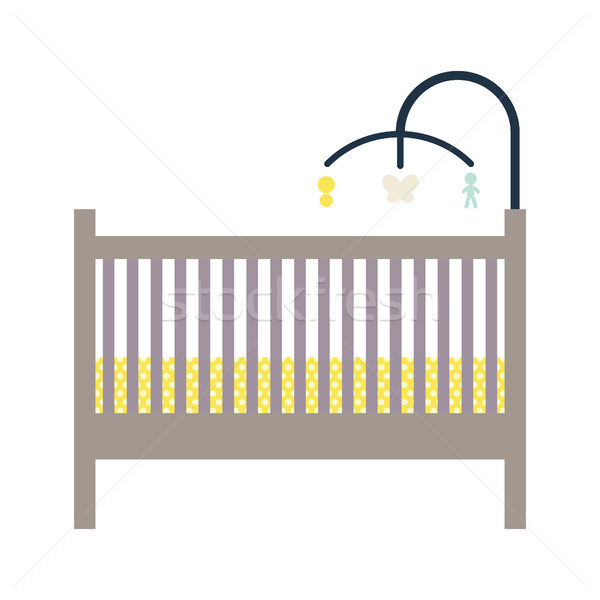 Newborn crib and mobile toy. Stock photo © yopixart