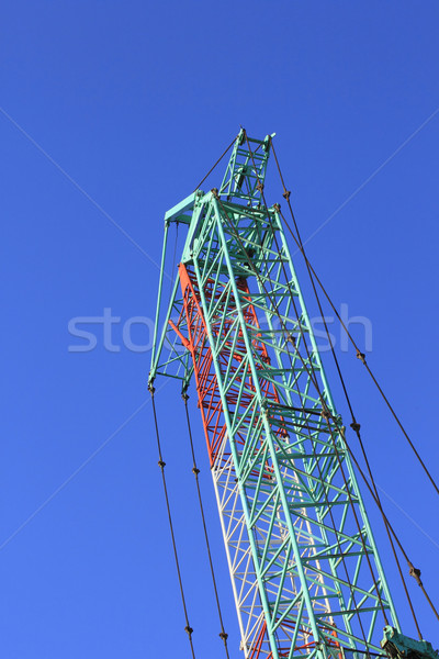 Żuraw maszyny Błękitne niebo działalności pracy metal Zdjęcia stock © yoshiyayo