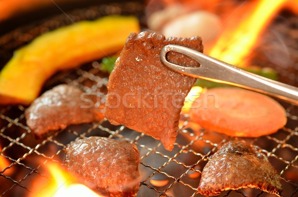 Vlees foto keuken brand vet vlam Stockfoto © YUGOKYOGO