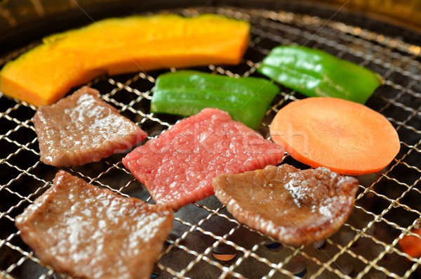 Vlees foto keuken brand vet vlam Stockfoto © YUGOKYOGO