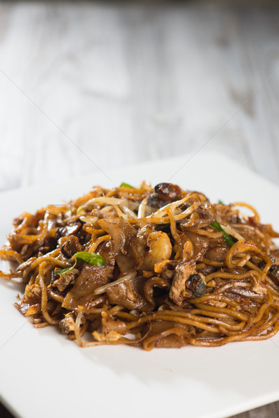 Fried Penang Char Kuey Teow which is a popular noodle dish in Ma Stock photo © yuliang11