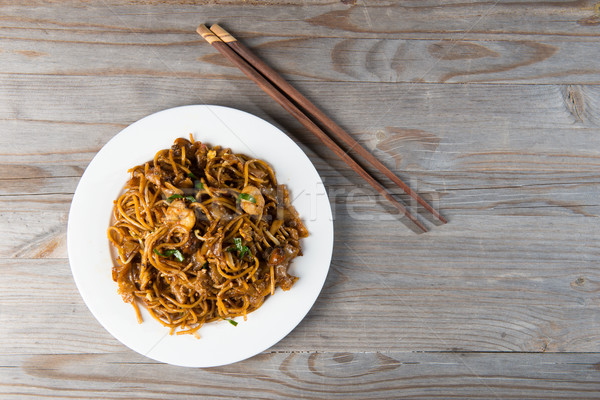 Fried Penang Char Kuey Teow top down view which is a popular noo Stock photo © yuliang11