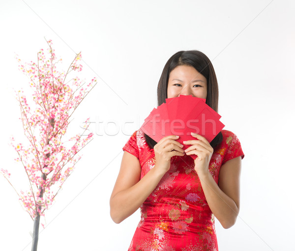 Happy Chinese new year asian girl. Asian girl doing greeting Stock photo © yuliang11