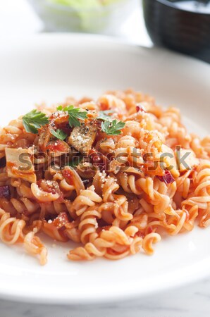 Shot pomodoro pasta tavola forcella Foto d'archivio © yuliang11