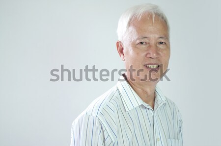 Uomo d'affari asian sorridere abbigliamento formale faccia felice Foto d'archivio © yuliang11