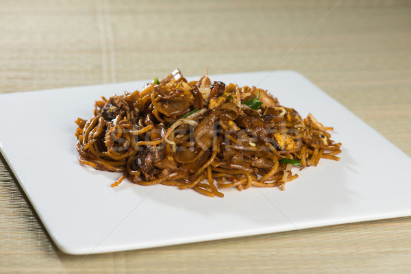 Fried Penang Char Kuey Teow which is a popular noodle dish in Ma Stock photo © yuliang11