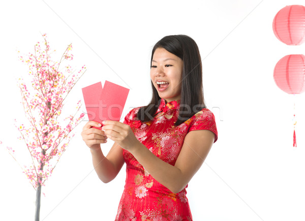 Happy Chinese new year asian girl. Asian girl doing greeting Stock photo © yuliang11